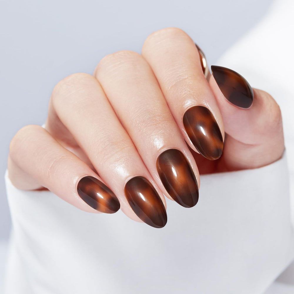 modelones front packaging showing brown almond press-on nails and kit benefits