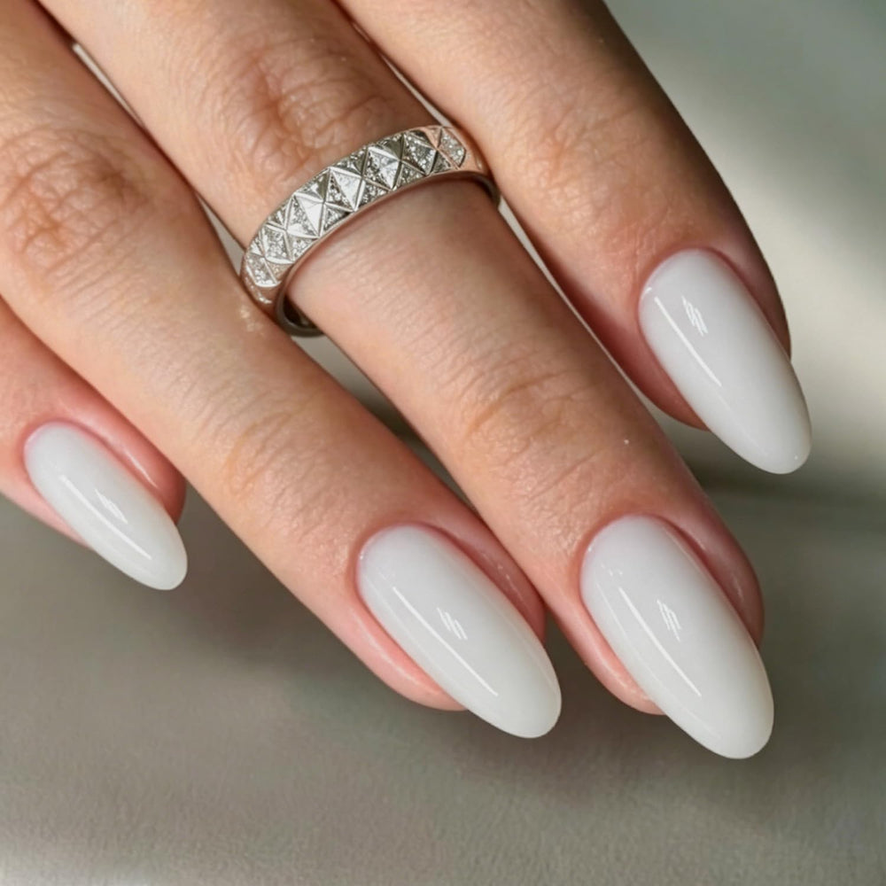 modelones front packaging showing milky white almond nails and kit components for convenience