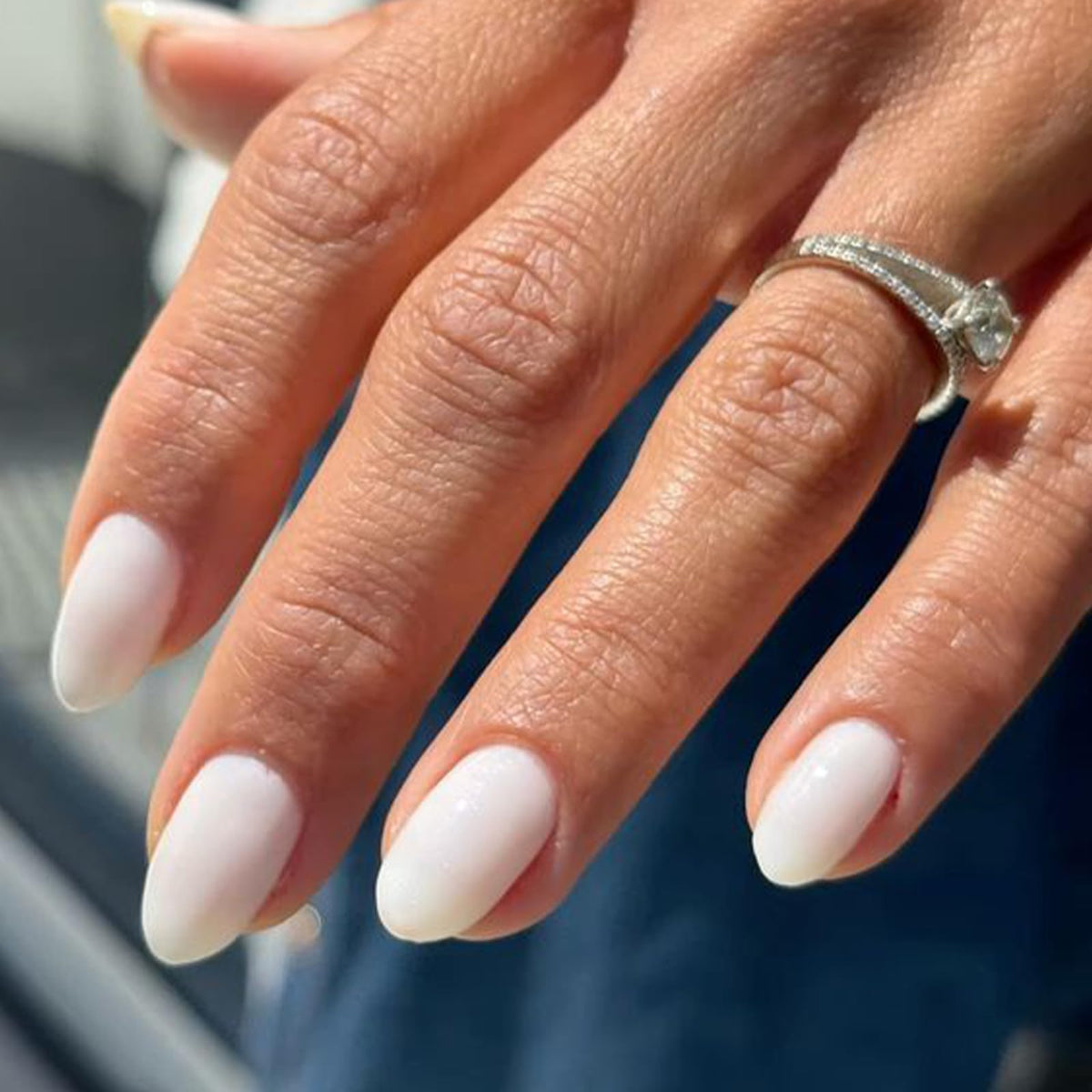 modelones front packaging showing milky white press-on nails and kit benefits