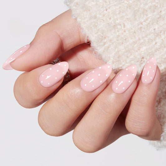 Modelones front packaging showing polka dot almond nails, ready-to-wear convenience