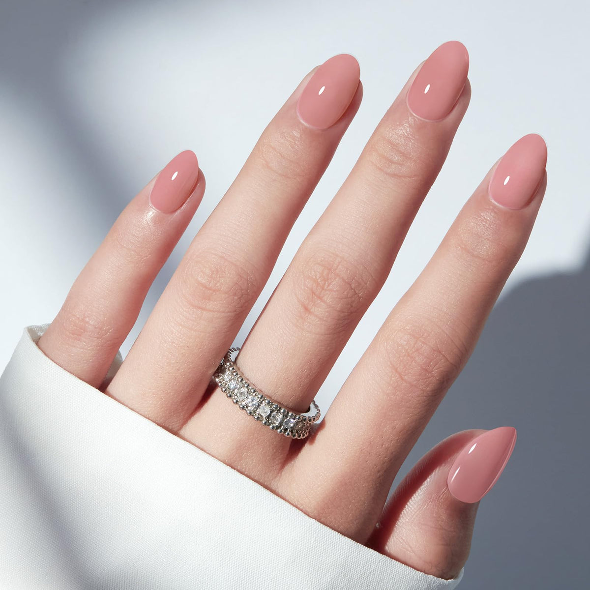 modelones front packaging showing soft pink press-on nails and kit details for quick purchase benefit