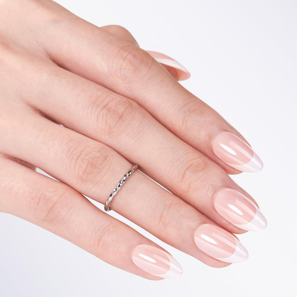 Modelones hand model wearing almond press-ons showing salon finish