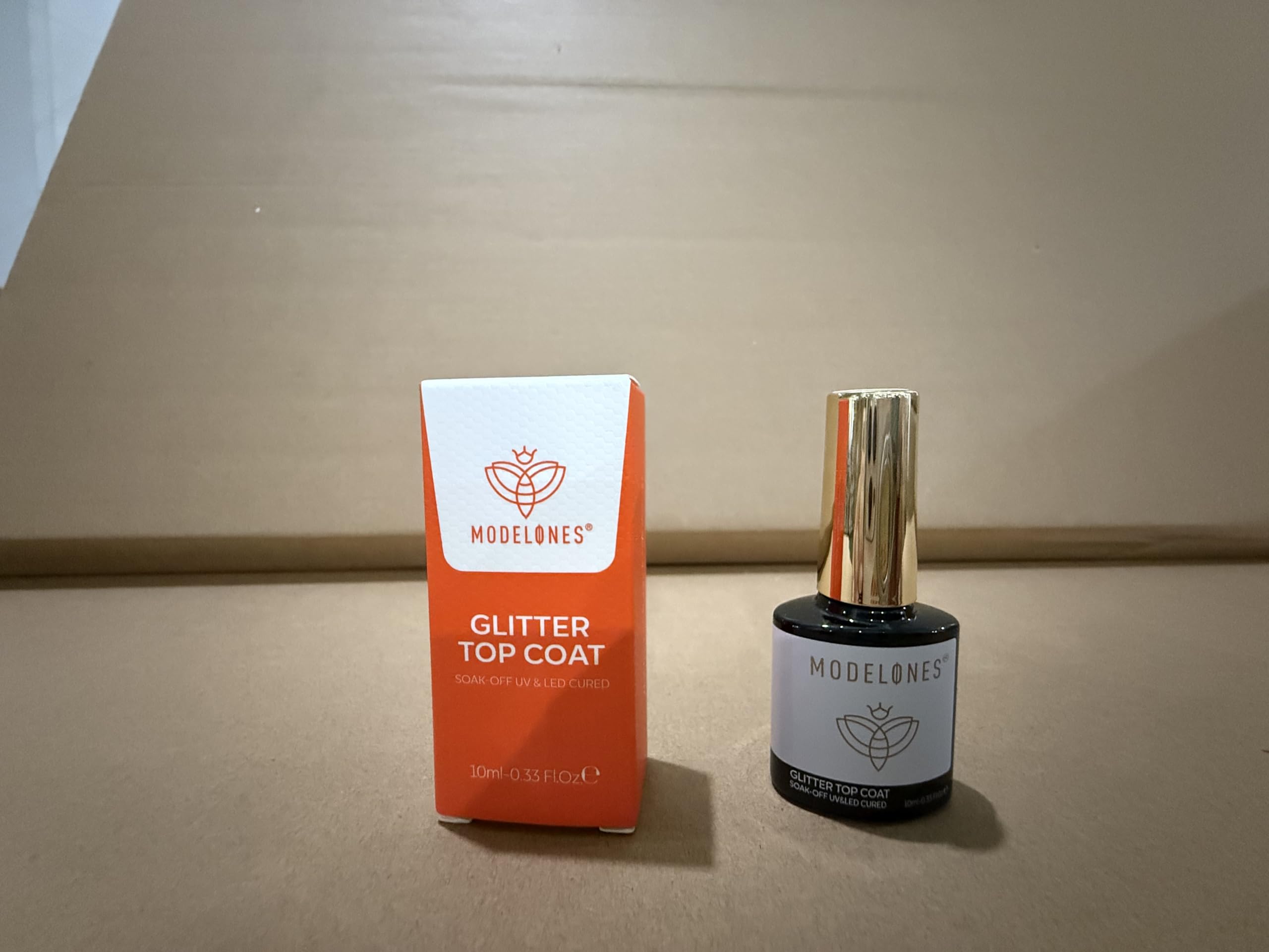 modelones finished manicure in a lifestyle setting showing wearable glamour benefit stylish result