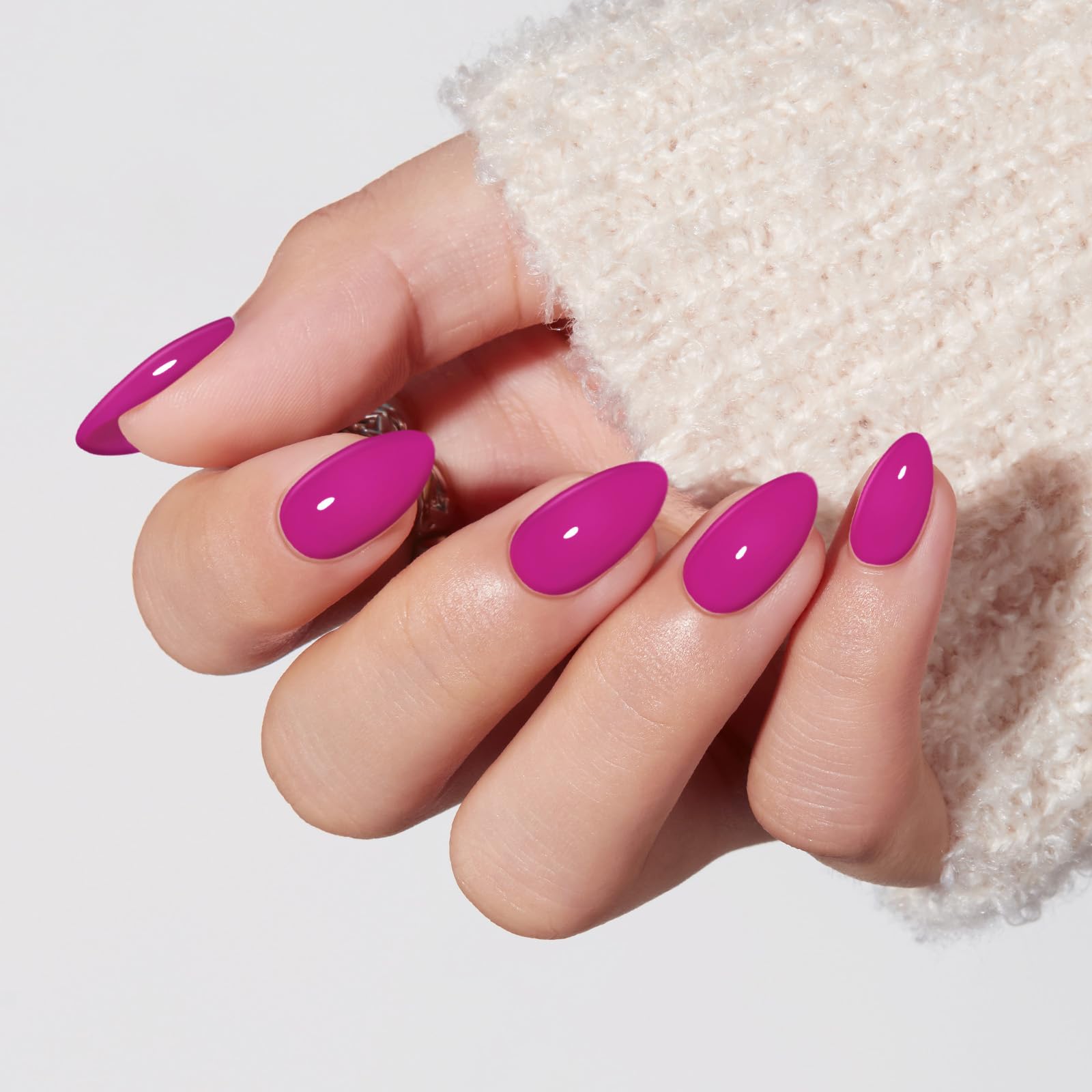 Modelones close-up of glossy fuchsia nail finish highlighting durability