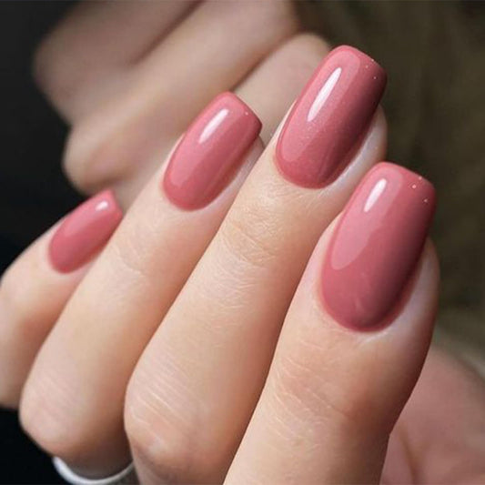 modelones close-up of nail finish highlighting smooth petal-pink surface and durability