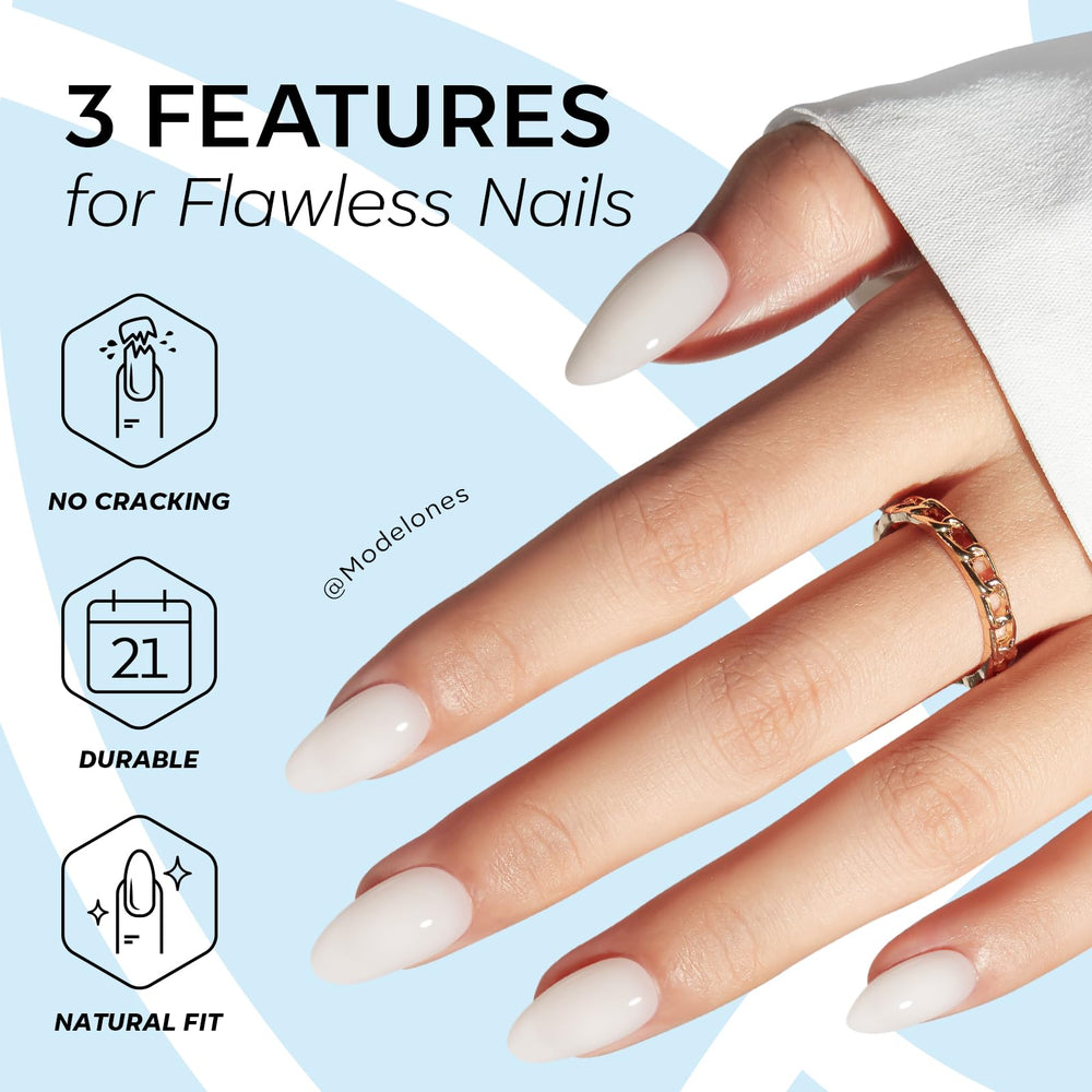 modelones kit components laid out with glue, adhesive tabs, file, and cuticle stick for easy use