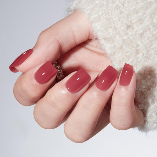 modelones rose red close-up of glossy nail finish highlighting durable shine