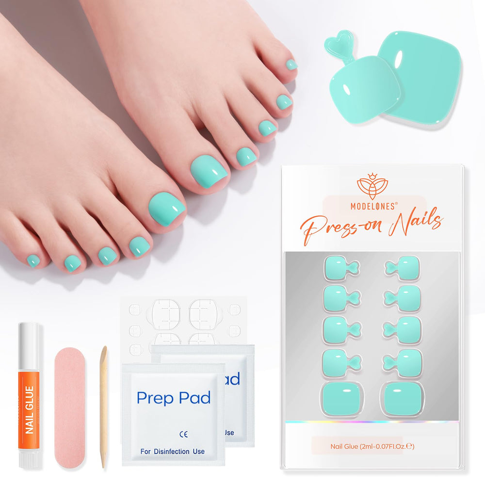 modelones nails next to a hand for scale to show short square size fit