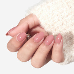 modelones close-up of semi-transparent oval nail showing smooth finish and natural appearance