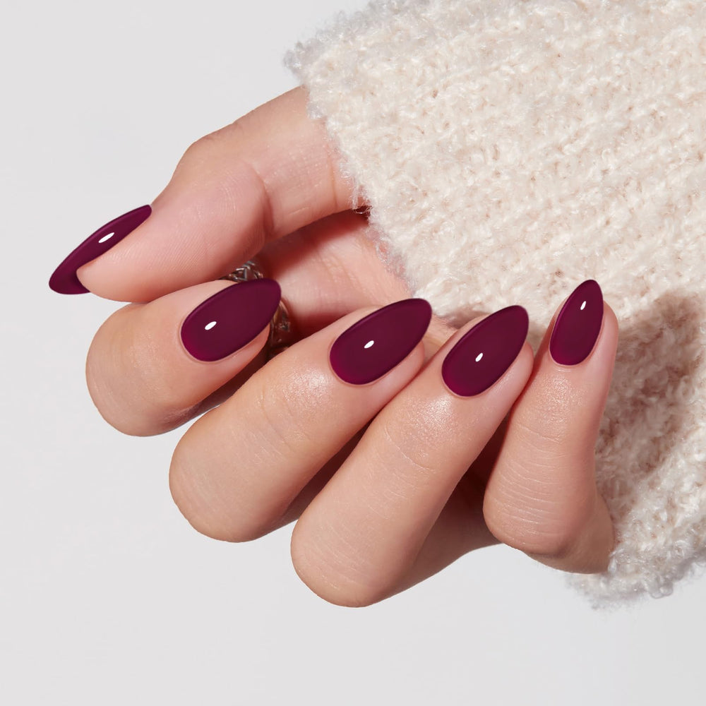 modelones close-up of short almond nails highlighting smooth finish