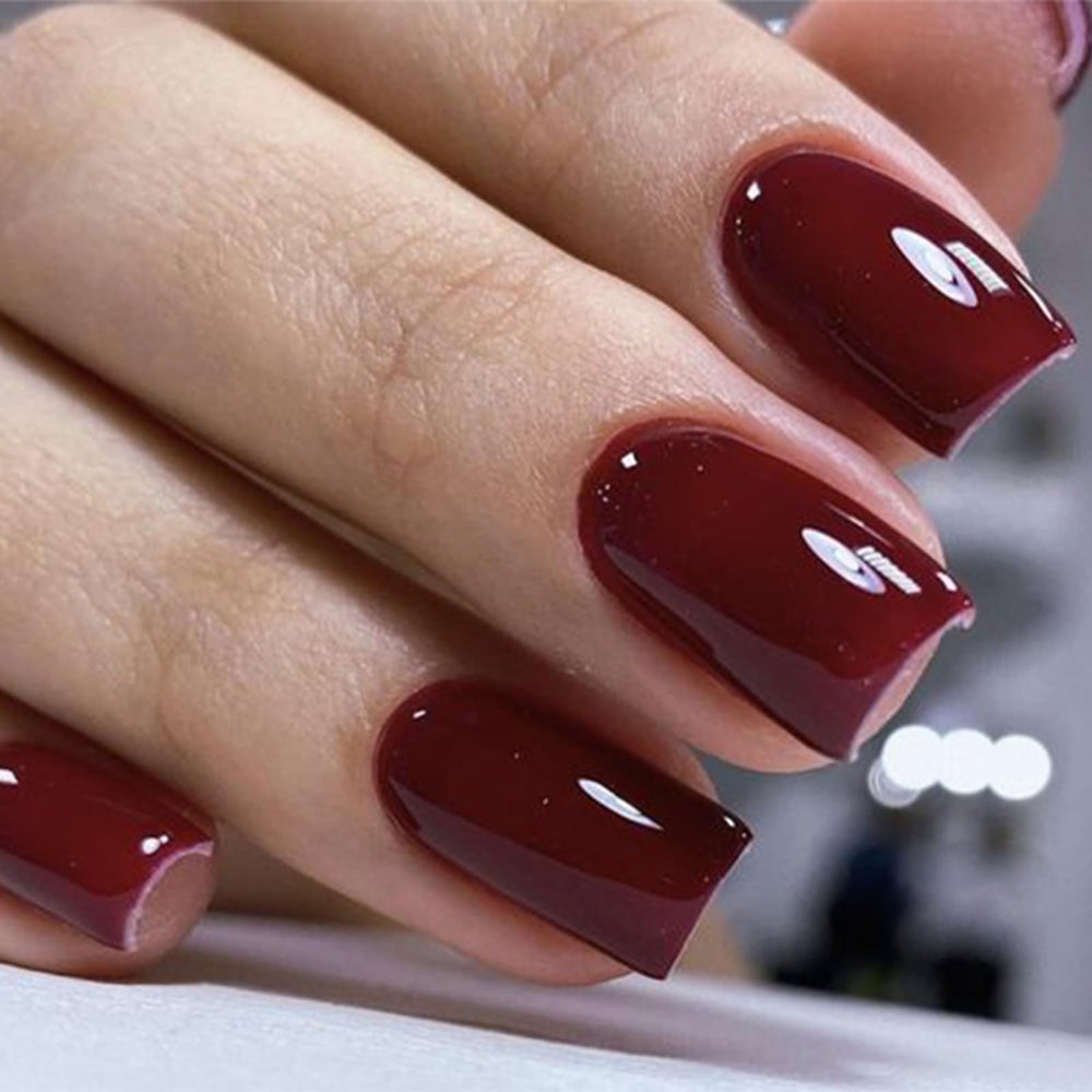modelones short square nail close-up highlighting glossy finish and durability benefit