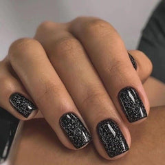 modelones close-up of short square nails showing sparkle finish