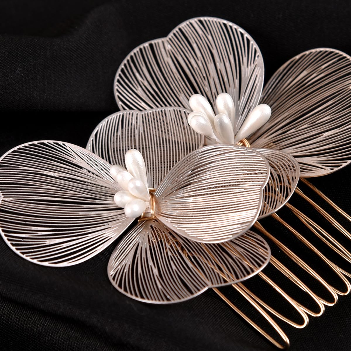 MOESUYUM side comb placed in an updo for secure hold and polished look