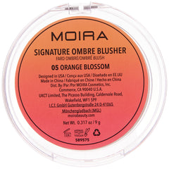 Moira blush being applied with a brush to cheek demonstrating blendability and natural finish
