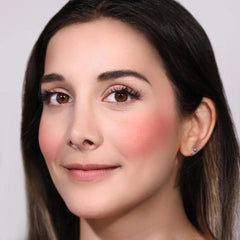 Moira drop of blush texture highlighting lightweight, silky formula for smooth finish