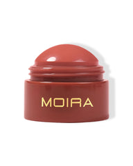 Moira front packaging showing compact balm and shade label, easy-to-use