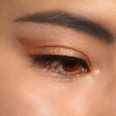Moira applied on model eye delivering luminous bronze definition and lift