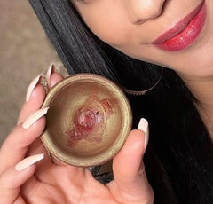 Molino Piane lip stain applied on lips showing even natural crimson color payoff