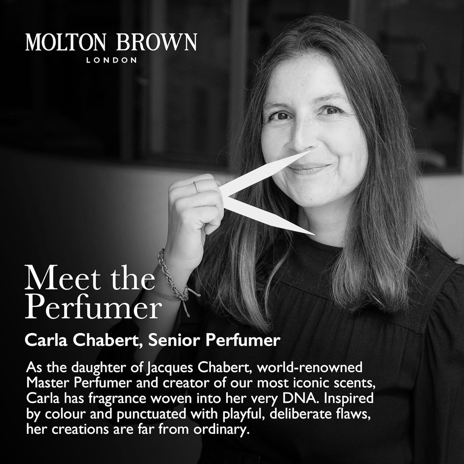Molton Brown bottle on shower shelf in use for an invigorating daily routine benefit