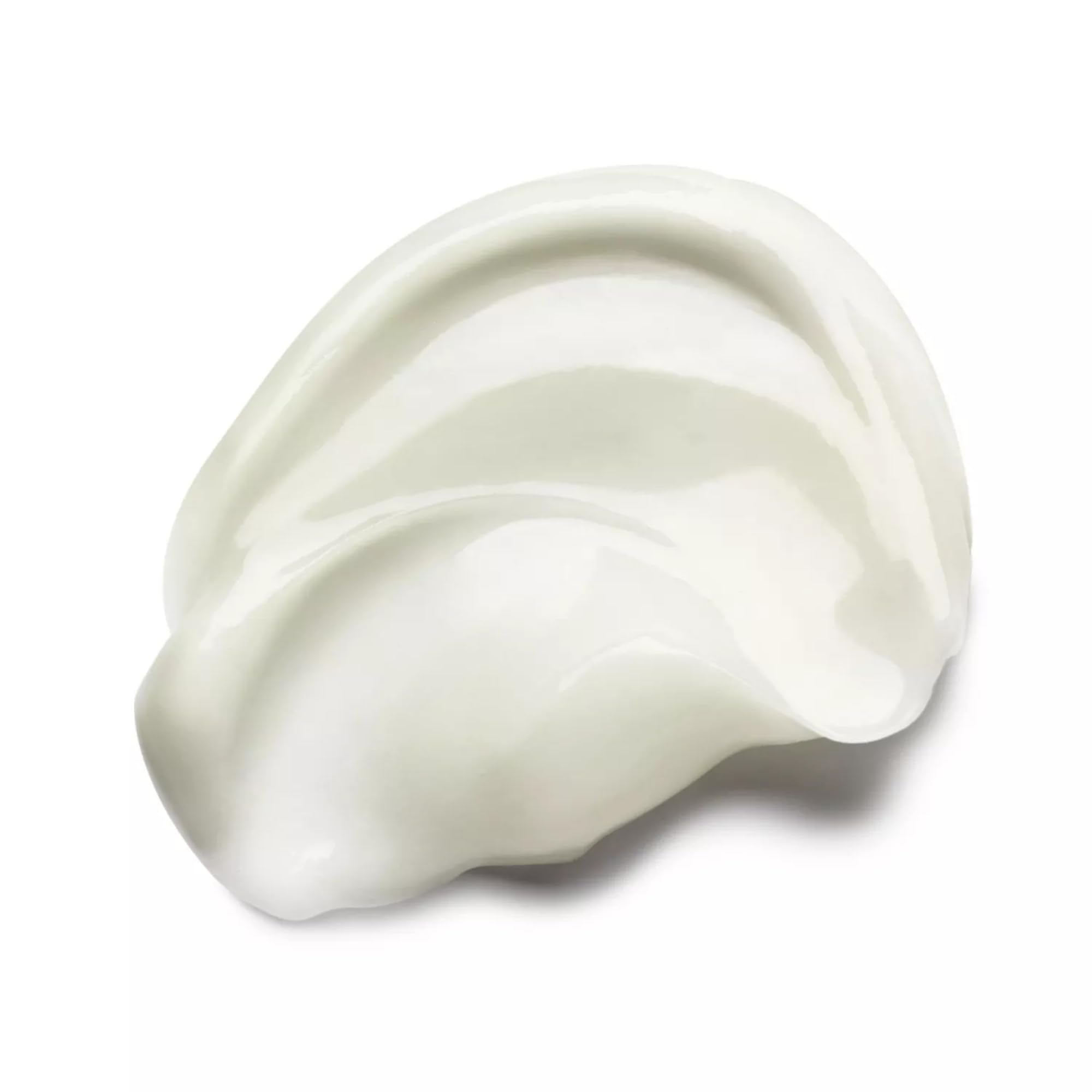 Molton Brown conditioner texture on hand highlighting smooth slip and hydration benefit