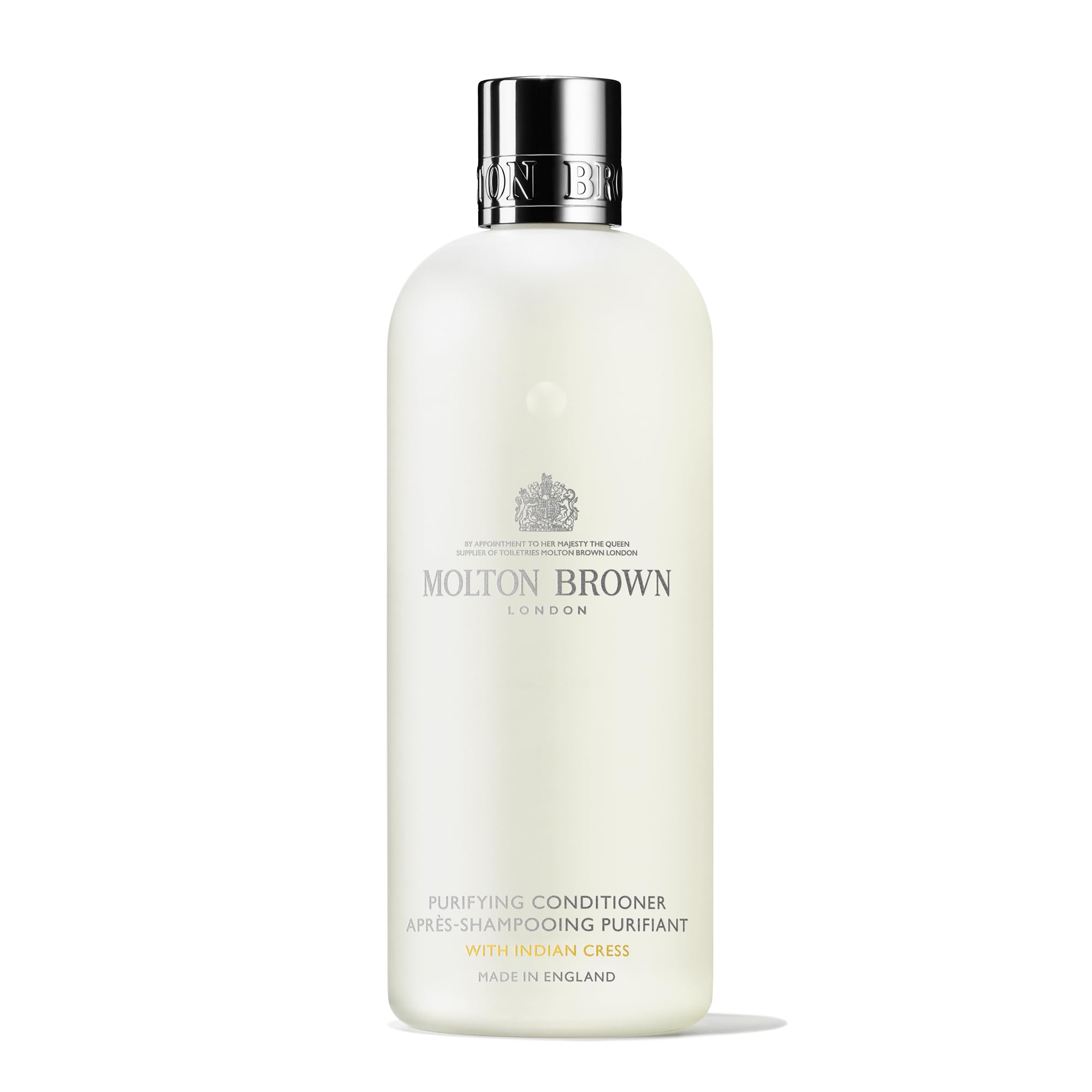 Molton Brown bottle front label showing product and volume, elegant presentation benefit