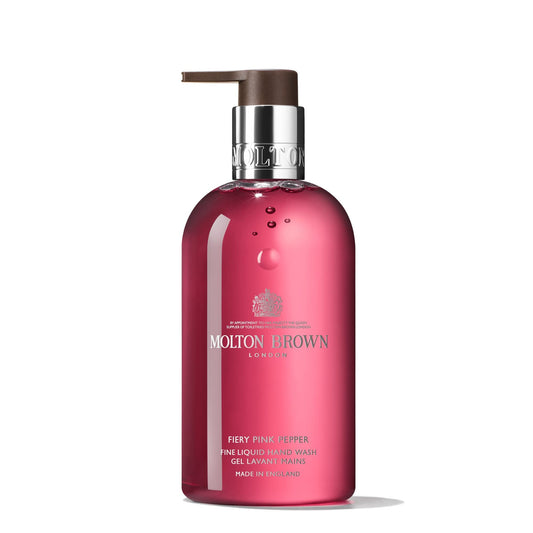 Molton Brown front bottle view showcasing Fiery Pink Pepper fragrance and elegant packaging benefit