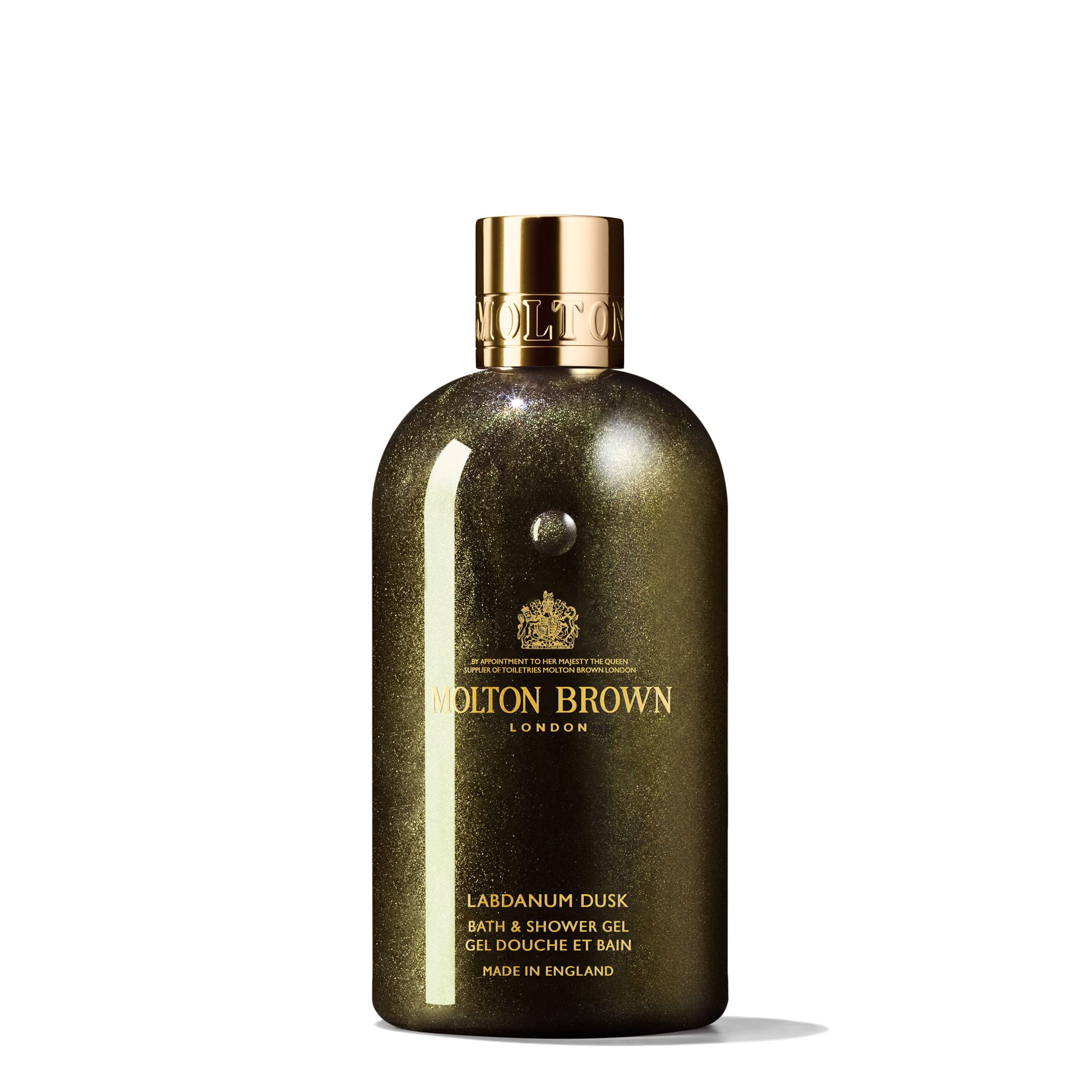 Molton Brown bottle front view showing label and luxurious amber hue, ideal for indulgent showers