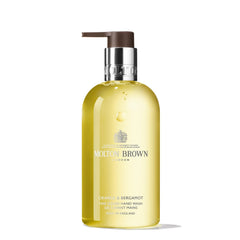 Molton Brown front bottle view showing citrus fragrance and elegant design benefit
