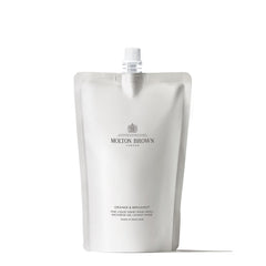 Molton Brown refill pouch front view showing citrus packaging and eco benefit