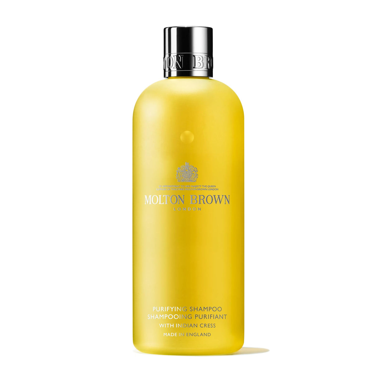 Molton Brown front bottle showing label and refined packaging with elegant scent