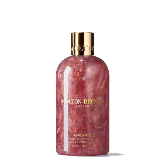 Molton Brown Rose Dunes front bottle displaying amber-rose gel and luxurious cleansing