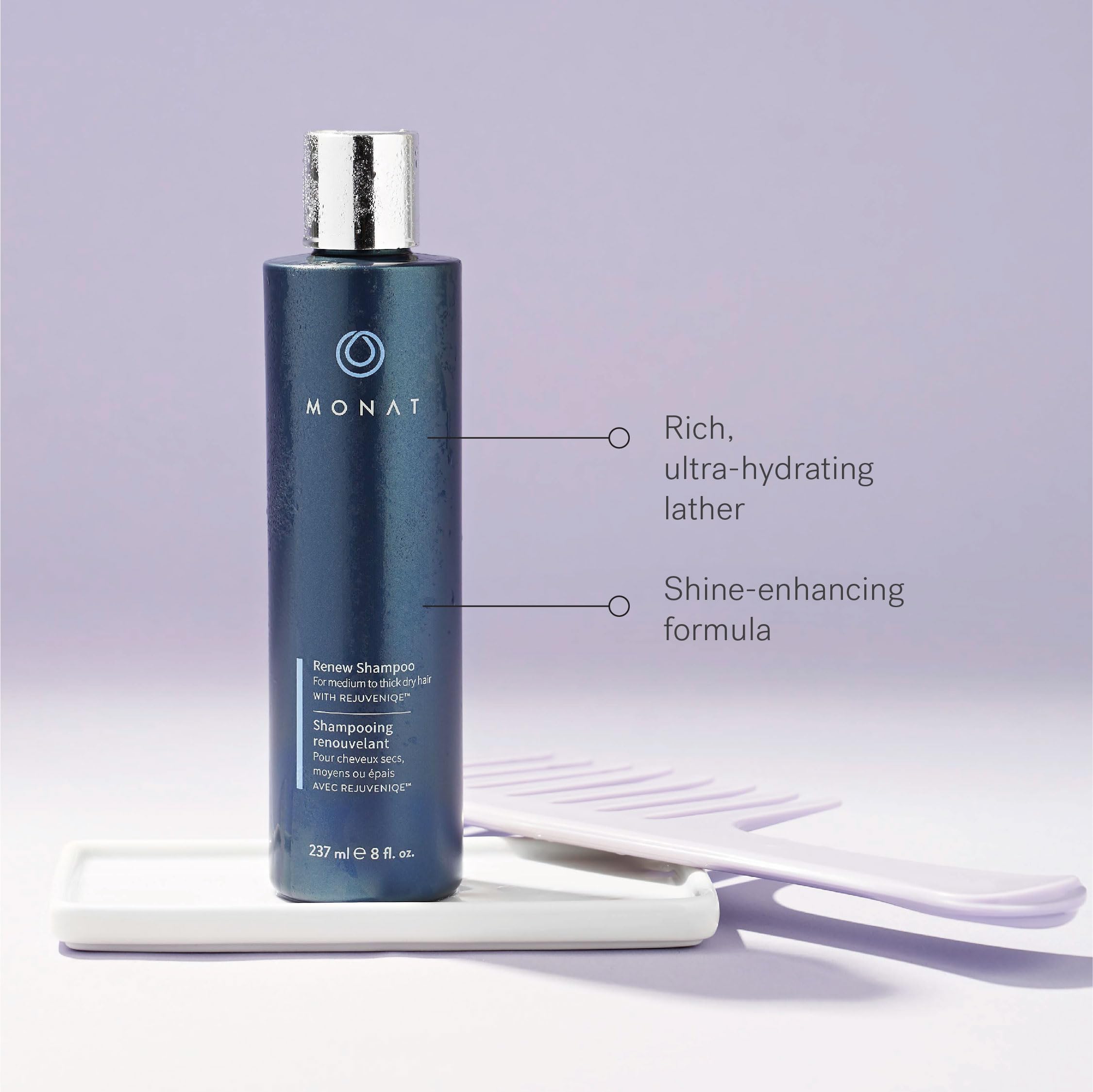 MONAT Renew Shampoo held in hand to show scale and travel-friendly benefit