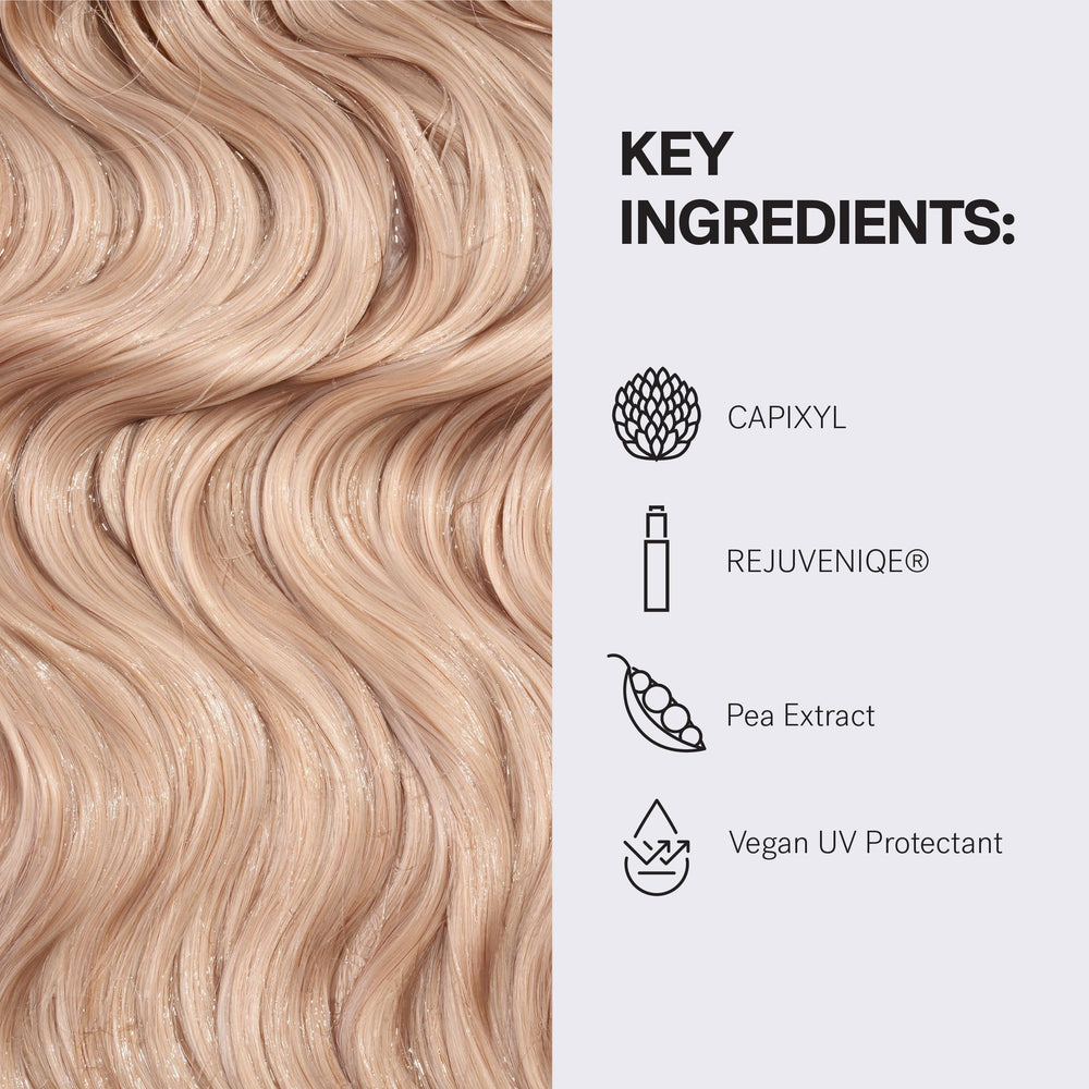 MONAT 237ml bottle in hand showing true size and travel convenience