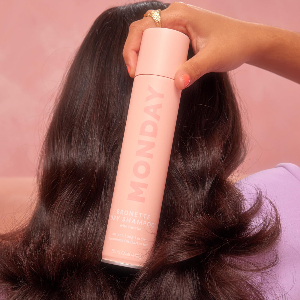 MONDAY HAIRCARE brunette in bathroom setting for convenient touch-ups