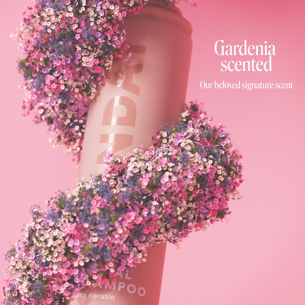 MONDAY HAIRCARE brunette spray landing on roots for instant oil absorption