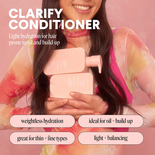 MONDAY HAIRCARE clarify open cap pouring conditioner to show creamy consistency and control