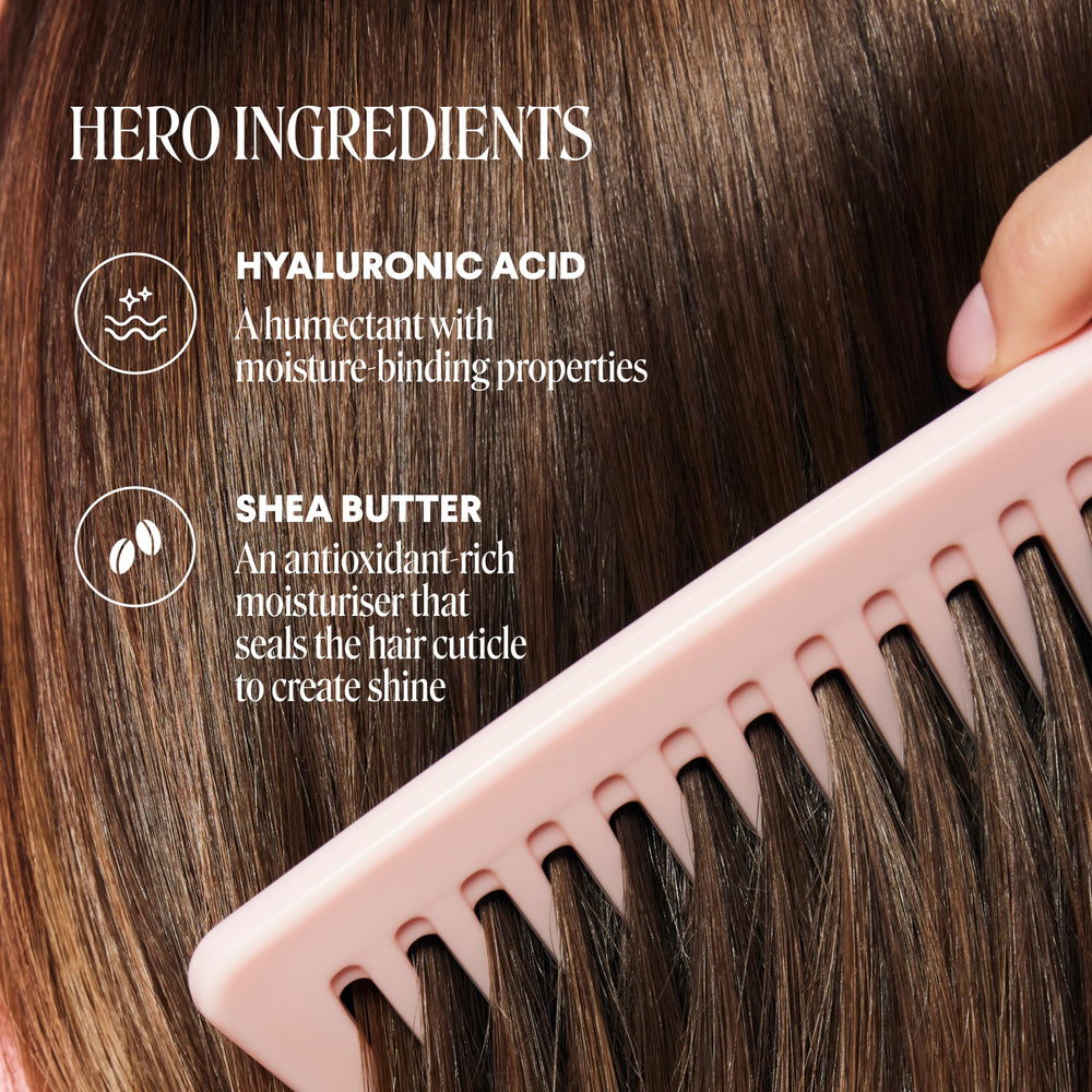 MONDAY HAIRCARE conditioner being applied to hair in hand for softening and detangling