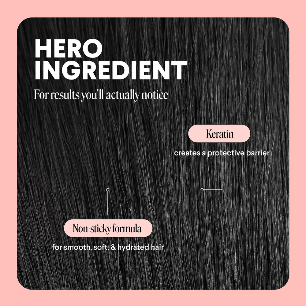 MONDAY HAIRCARE bottle in hand to show size and travel-friendly convenience
