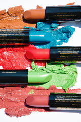 Mood Lips side label close-up showing ingredients like Aloe Vera and vitamins