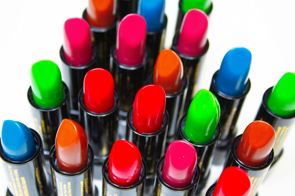 Mood Lips next to a travel bag showing portability and on-the-go convenience