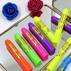Moonear crayon held in hand showing portable size and travel-friendly use