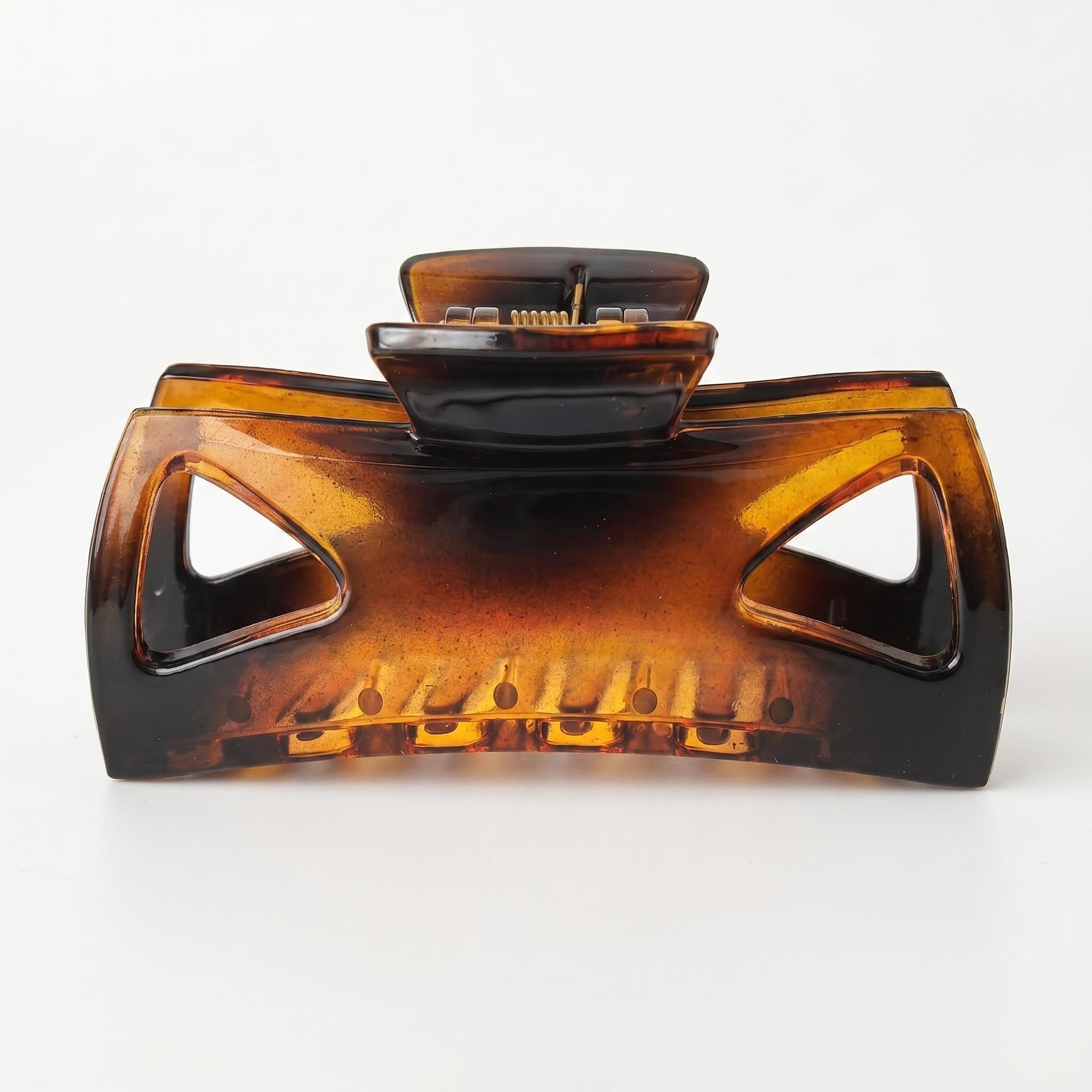 Morhom brown clip front view showing polished acetate and strong hold