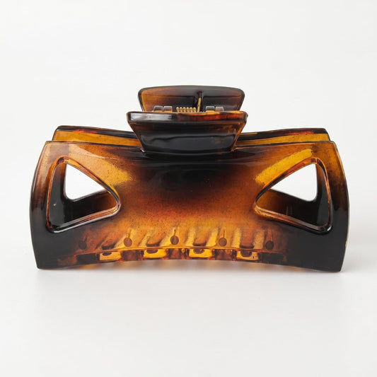 Morhom brown clip front view showing polished acetate and strong hold