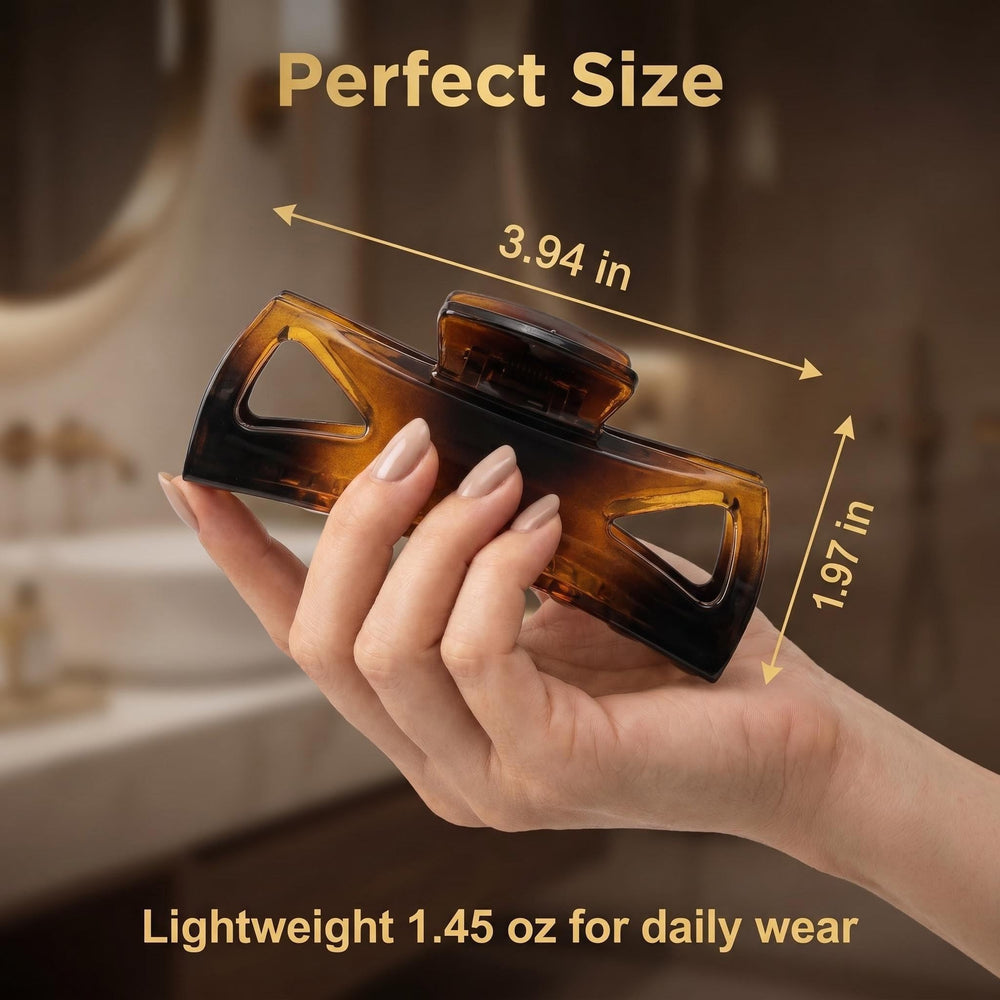 Morhom clip in hand to show compact size and travel-friendly benefit