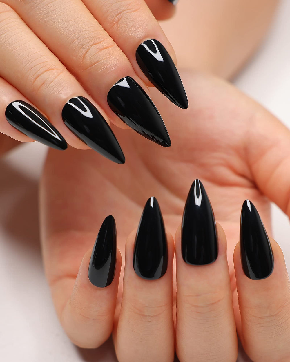 morily front packaging showing glossy black stiletto nails and neat layout, professional look