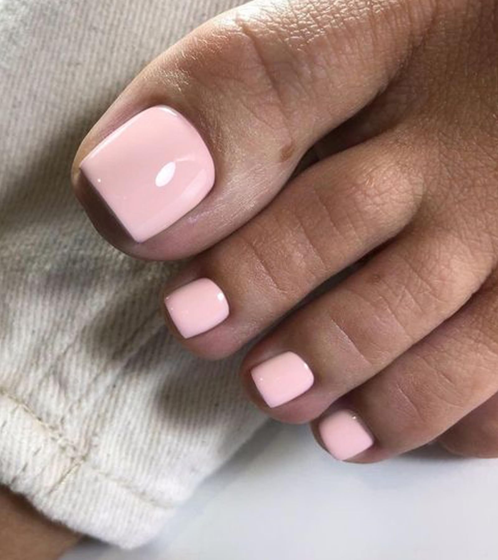 morily top view of all 28 toenails arranged by size for easy selection benefit