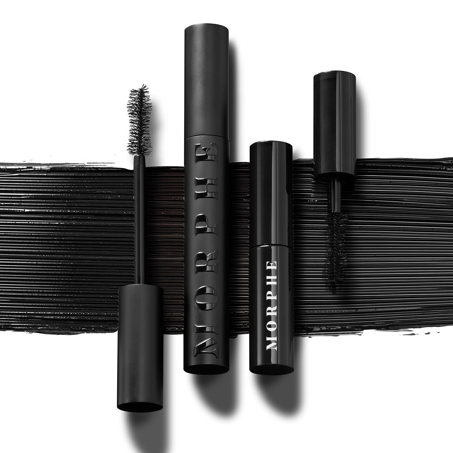Model applying Morphe Make It Big showing lifted lashes and instant volume benefit