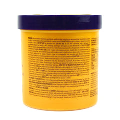 Motions cream on hair strand showing smoothing action and manageability benefit