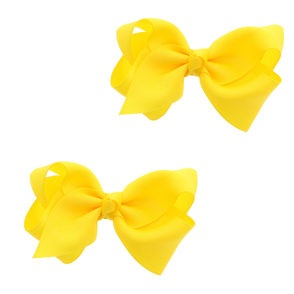 Motique Accessories front view of sunshine yellow bows, bright accent for outfits