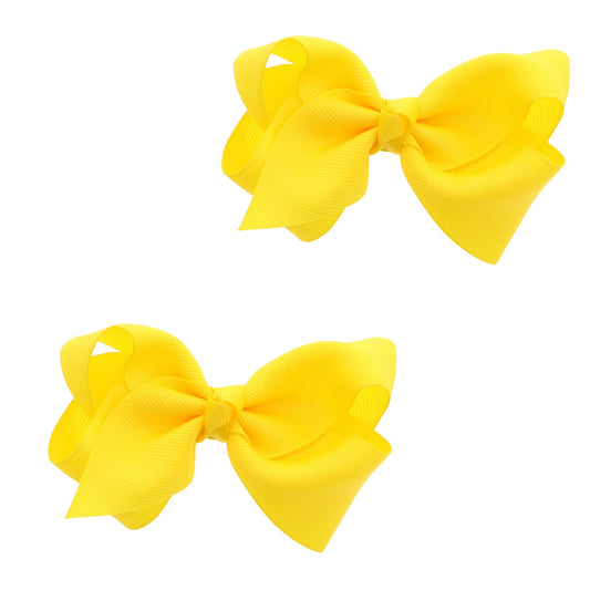 Motique Accessories front view of sunshine yellow bows, bright accent for outfits